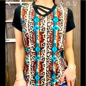 Leopard, Turquoise and coral top.